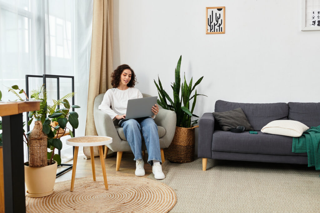 young-woman-enjoys-productive-day-working-from-her-cozy-home-office-space